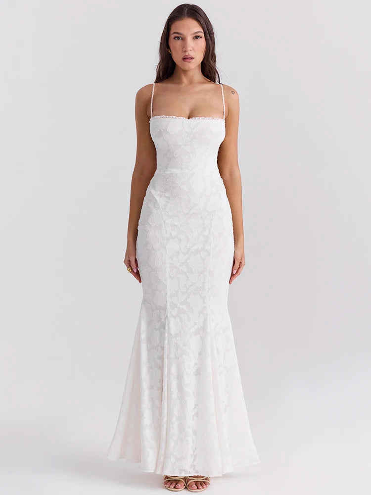 White mermaid-style maxi dress with lace print and lace-up closure. Features slight stretch, strapless design, and ankle-length fit. Made from polyester, spandex, and mesh.