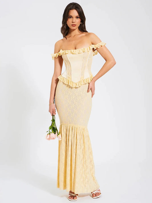 ellow maxi dress with lace print, a corset bodice, and a mermaid-style skirt. Features slight stretch, strapless design, backless detail, and ankle-length fit. Made from spandex, mesh, and polyester