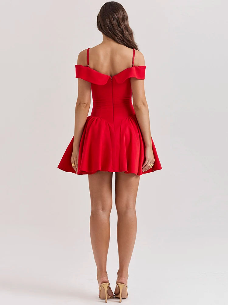 Red mini dress with an A-line silhouette, off-shoulder design, and medium stretch. Features a sheath fit, strapless neckline, spaghetti straps, and above-knee length. Made from spandex and polyester with a zipper closure.