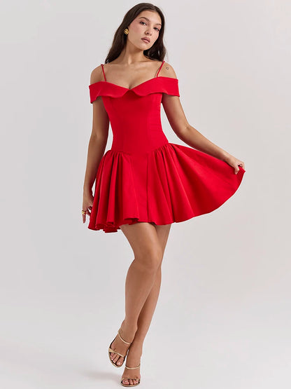 Red mini dress with an A-line silhouette, off-shoulder design, and medium stretch. Features a sheath fit, strapless neckline, spaghetti straps, and above-knee length. Made from spandex and polyester with a zipper closure.