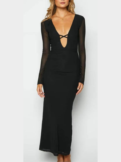 Woman wearing ablack Maxi Dress, hollow-out bodycon, sheer mesh long sleeves, lace-up design, reversible wear.