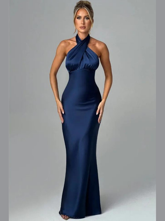 Woman wearing a blue Elegant backless satin dress with a neck-mounted halter design, lace-up detail, and slim fit silhouette