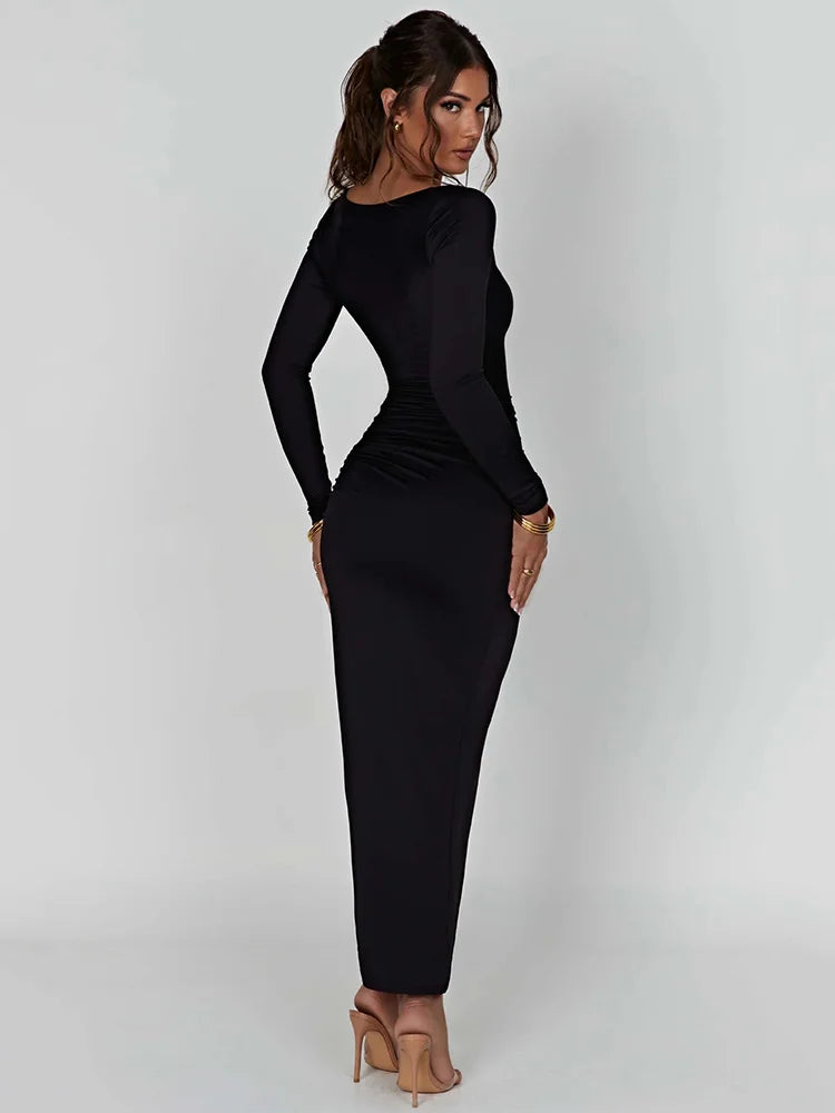 Black long-sleeve bodycon maxi dress with a square collar and a thigh-high split on one side, featuring drawstring detail.