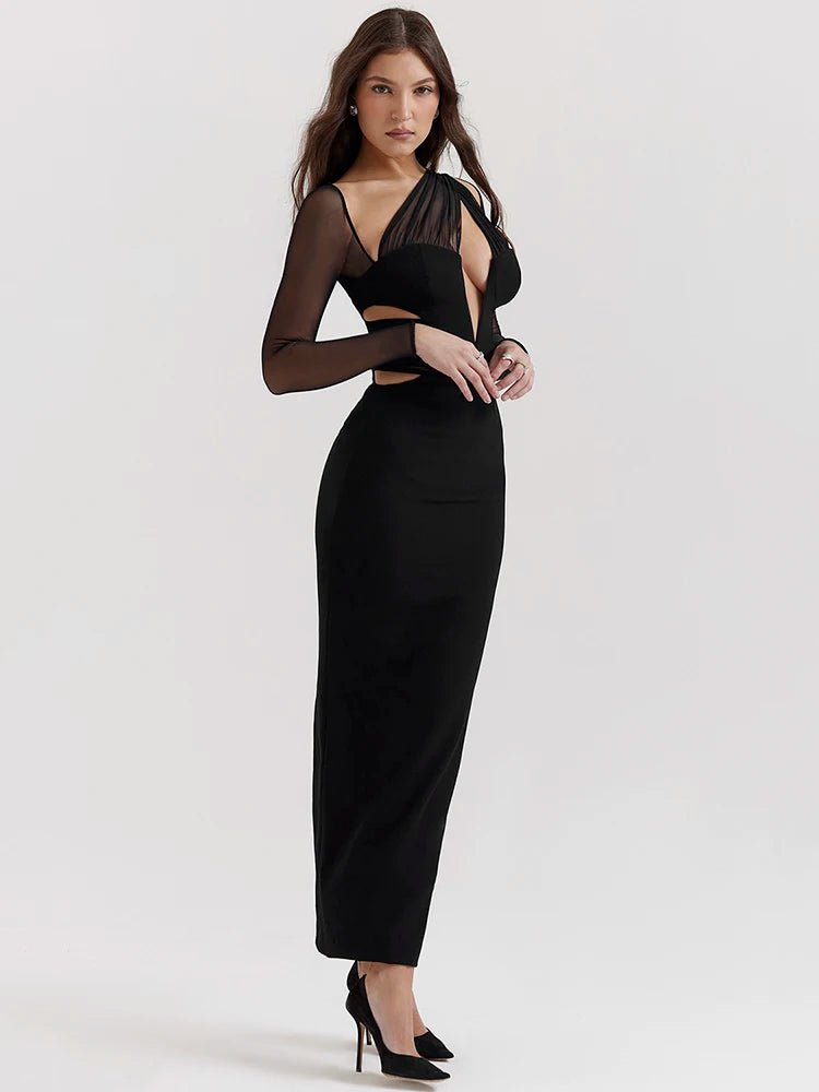 Black bodycon maxi dress with sheer long sleeves and hollow-out details.