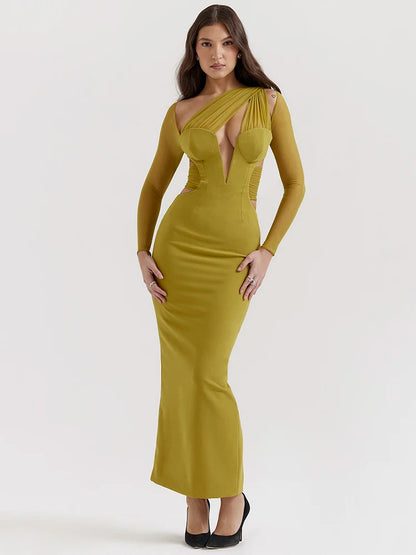 Yellowish green bodycon maxi dress with sheer long sleeves and hollow-out details. 