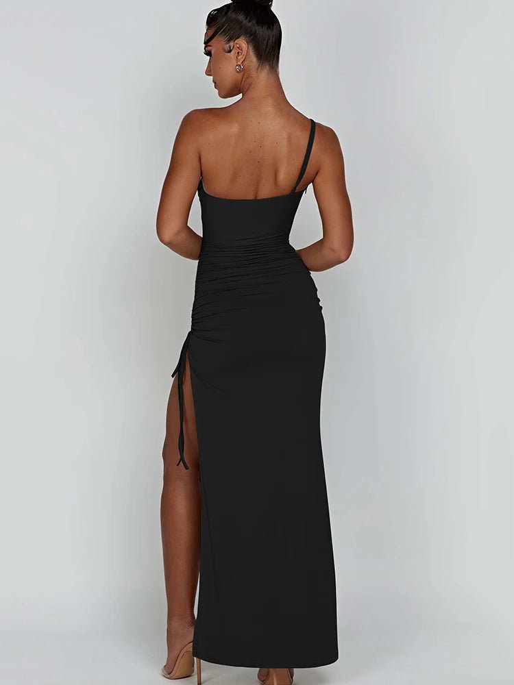 Black one-shoulder bodycon maxi dress with a high slit and drawstring detail. Features a diagonal collar necklinei