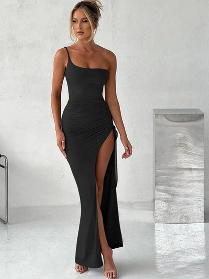 Black one-shoulder bodycon maxi dress with a high slit and drawstring detail. Features a diagonal collar necklinei