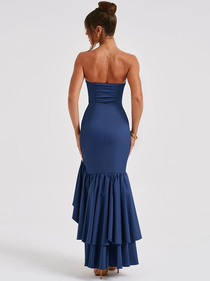 Blue bodycon long dress with a high split ruffle skirt, sleeveless design, and off-shoulder neckline.